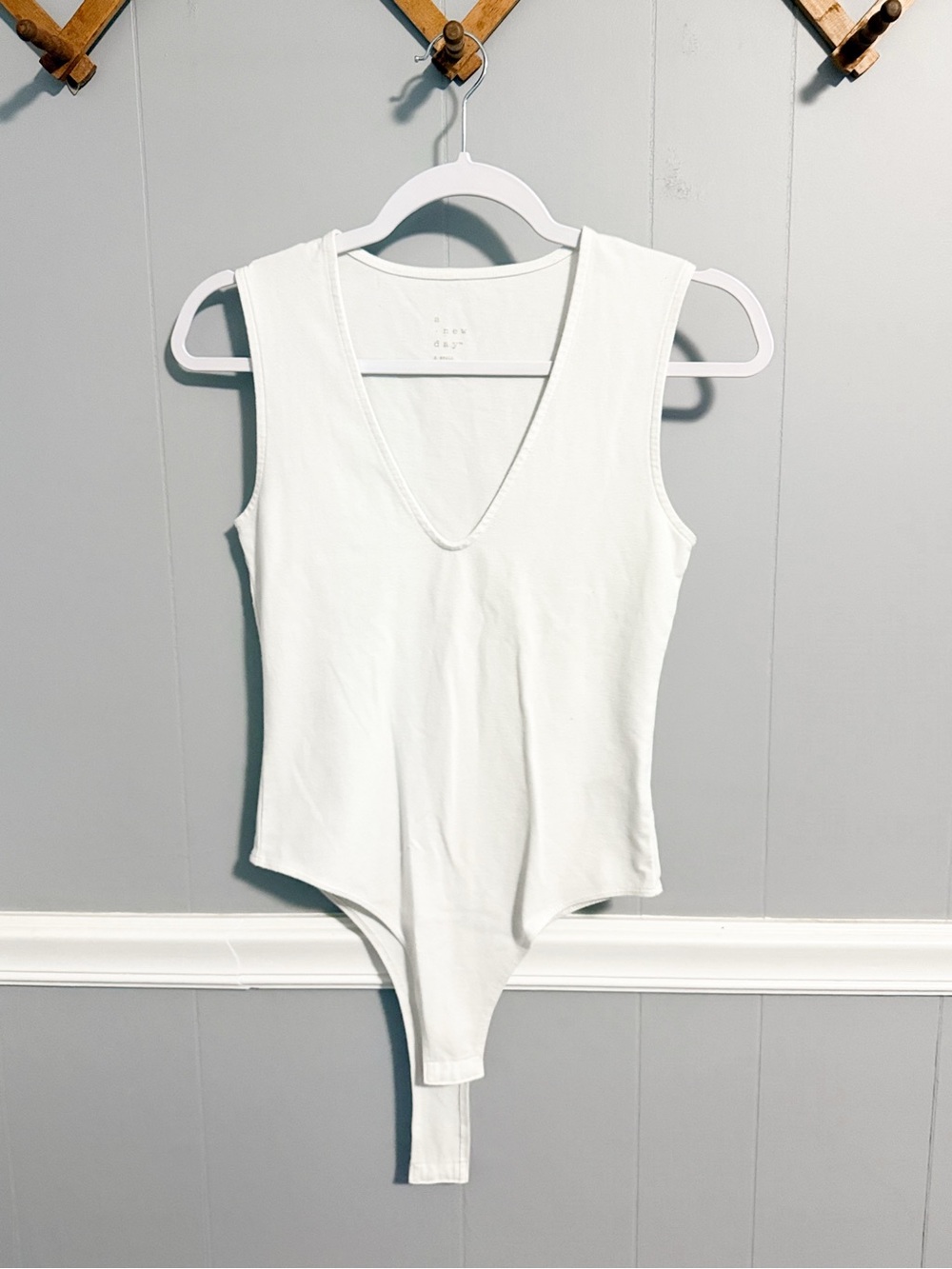 a new day White V-Neck Sleeveless One-Piece Bodysuit